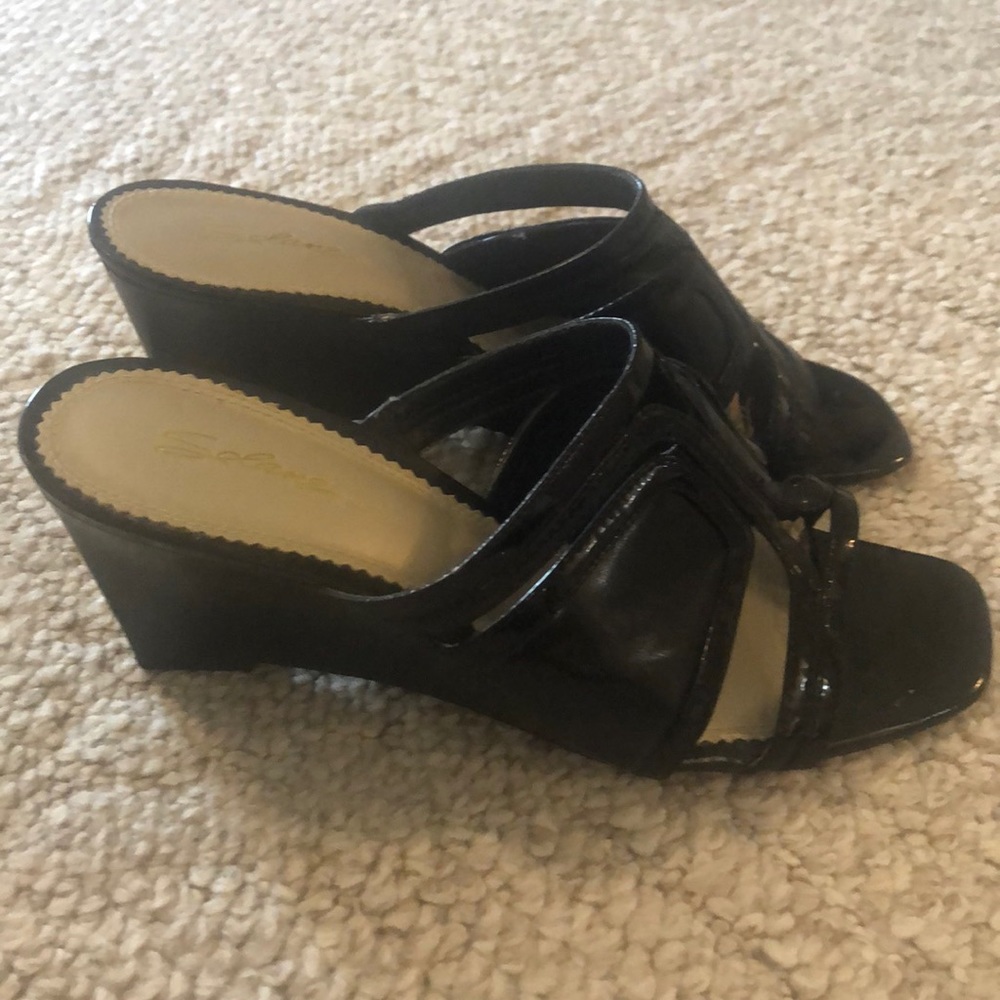 NEW. Black wedge heel sandals with open toe.